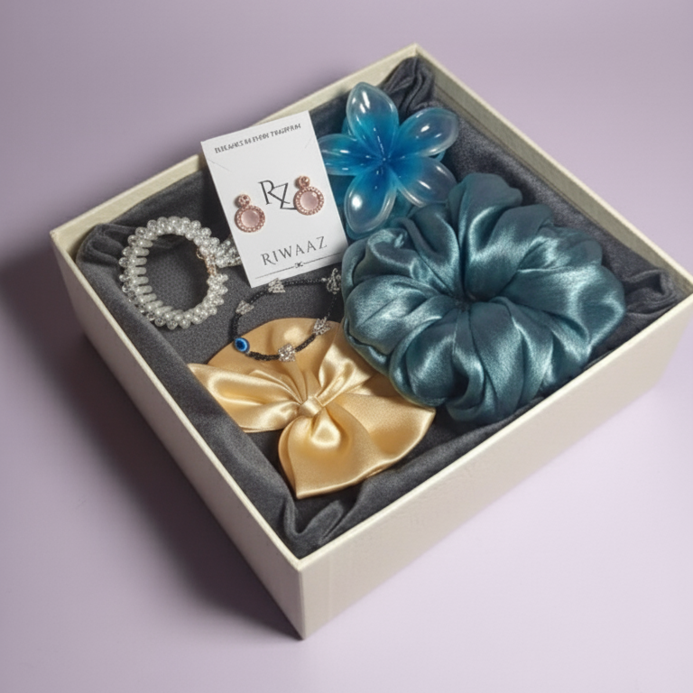 Set of decorative items including scrunchies and a flower in a box with 'RIWAZ' branding.